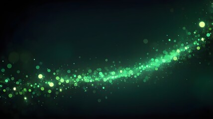 Abstract green bokeh lights shining in the dark.
