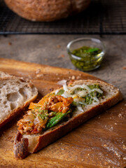 Sliced Artisan Sourdough Bread on Wooden Table.