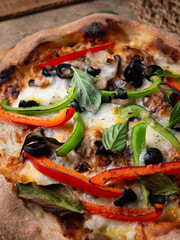 Homemade Sourdough pizza on Wooden Table.