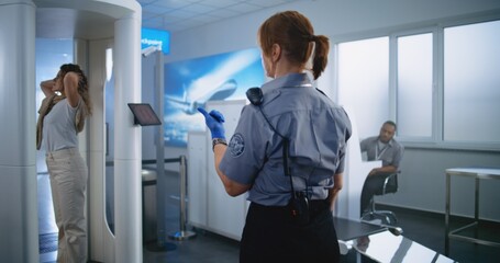 Airport Terminal: Woman Walks Through Metal Detector Gates, Takes Luggage from Conveyor Belt....
