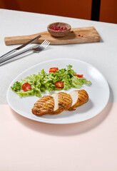 Grilled Chicken Filet with Salad on White Plate - Fresh and Minimalistic Culinary Photography