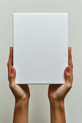 Obraz premium White box held prominently against a minimalist white background