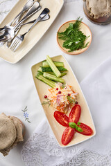 Rustic Assorted Pickles on Elegant Table Setting with Natural Light
