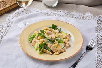Elegant Caesar Salad with Chicken Fillet on Lace Tablecloth – Rustic Chic Style