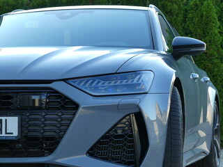 Gray car on the parking lot.