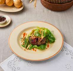 Elegant Beef Steak with Lettuce - Warm Tones and Balanced Composition in Modern Food Photography