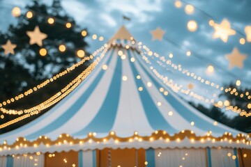 A striking gold-and-white striped circus tent features soft glowing lights and is set against a twilight sky filled with sparkling stars, perfect for an upscale event or branding opportunity