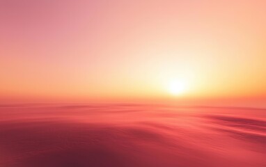 Fototapeta premium Smooth gradient background transitioning from deep orange to soft pink, creating a warm sunset atmosphere. Perfect for backgrounds, designs, and digital art.