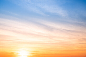 Sky,sunset, beautiful , luxury soft gradient orange gold clouds and sunlight on the blue sky perfect for the background, Sunrise on morning or everning in winter warm time ,Twilight summer,silhouette