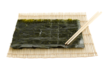 sushi rolling mat with nori sheet isolated on transparent white background