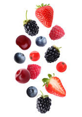 Blueberries, cherries, raspberries, blackberries, strawberries and redcurrant berries in air on white background