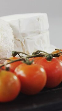 Cheese with tomatoes and rosemary herb