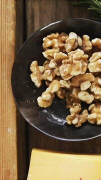 Jam, rosemary herb, walnuts, cheese, sauce, crispy biscuits and grater