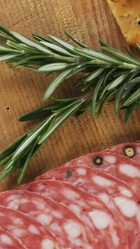 Crispy biscuits, rosemary herb and sliced meat