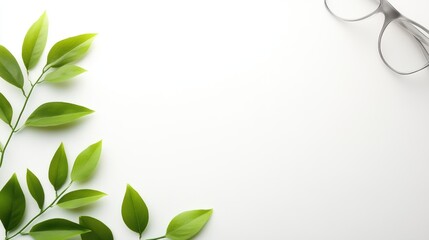 Obraz premium A clean, minimalist composition featuring green leaves and a pair of glasses, ideal for promoting themes of nature, wellness, or mindfulness in marketing, presentations, and social media,