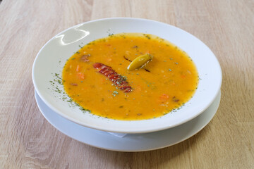 Hearty lentil soup with sausage and pepper