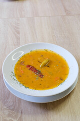 Hearty lentil soup with sausage and pepper