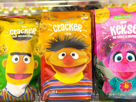 Colorful sesame street snacks featuring ernie bert abby characters on display