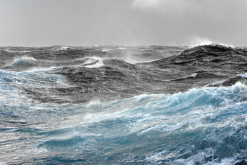 Naklejka premium Rough seas. Waves and spray.