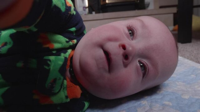 Cute Baby Trying to Grab the Camera