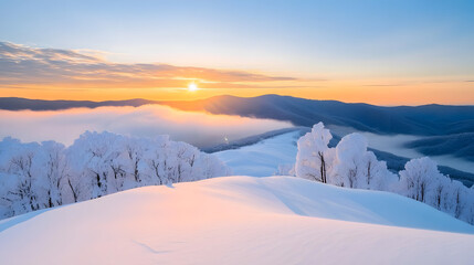 Snowy Mountain Sunrisewith mist rolling through the valleys.