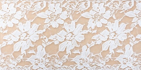 Elegant white floral lace pattern on beige fabric background