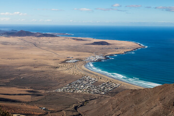 Surf Beach/An ariel view of a beautiful surfing beach called Playa De Famara shot on the Island of...