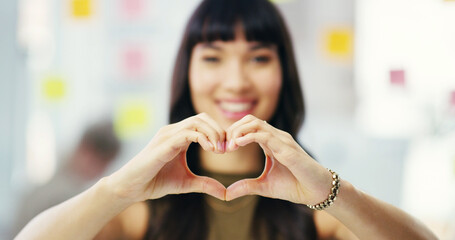 Woman, heart hands and professional in office, motivation and love for moodboard solution. Female person, employee and emoji for business approval for planning, target pride and support for agenda