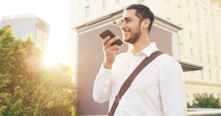 Business, city and voice recording with man outdoor for communication or travel to work. Memo,...