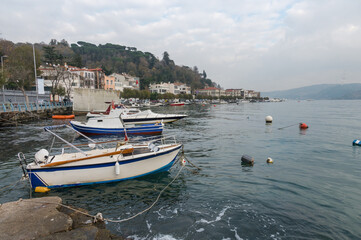Fototapeta premium Evening view of the embankment of the fishing village of Sariyer along the Bosphorus