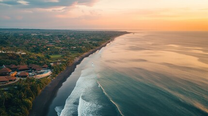 Naklejka premium Aerial View of Coastal Town at Sunset with Black Sand Beach