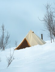 A campsite in a wintery forest, featuring a tent prepared for snowy conditions. Hiking gear and outdoor adventure await.