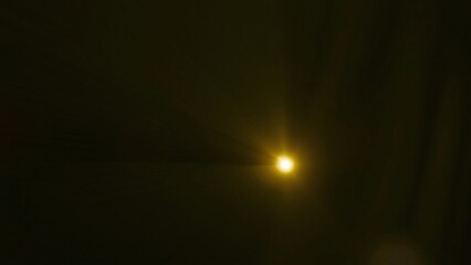 Golden Light Flare in Dark Background - Abstract Overlay