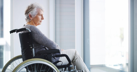 Depression, lonely and sad with old woman in wheelchair, thinking of past memories or loss. Nostalgia, nursing home or retirement and senior person with disability in apartment for reflection