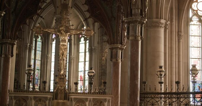 golden altar cross in catholic cathedral of Linz