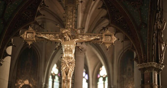 golden altar cross in catholic cathedral of Linz
