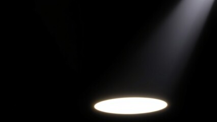 Spotlight Illuminating a Dark Stage - Dramatic Light Effect