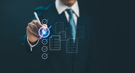 assessment form and Document Management System Concept ,Businessman using pen to check boxes to fill out online survey or checklist. Performance appraisal and document approval with virtual screen