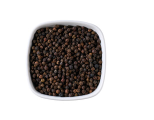 black pepper seeds in a ceramic bowl isolated on white background, top view.