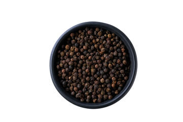 black pepper seeds in a black ceramic bowl isolated on white background, top view.