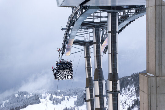 Special art cabin arriving at mountain station of Maschgenkamm cable car running between Tannenbodenalp and Maschgenkamm on a winter day. Photo taken January 29th, 2025, Flumserberg, Switzerland.