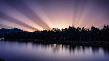 Fototapeta premium Serene Sunset over Silhouetted Forest and Calm Lake
