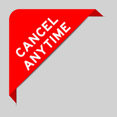 Red color of corner label banner with word cancel anytime on gray background