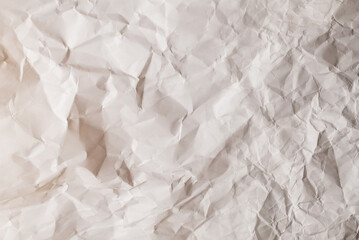 Obraz premium Crumpled white paper background.