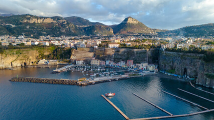 Sorrento Coast. Aerial photo of the Marina di Cassano port in Piano di Sorrento. Characteristic landscape of the city on the cliff overlooking the sea