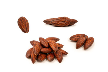 A group of caramelized almonds isolated on a white background.