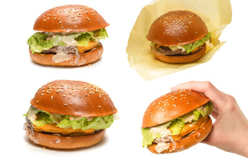 Hamburger in woman hands isolated on a white background.