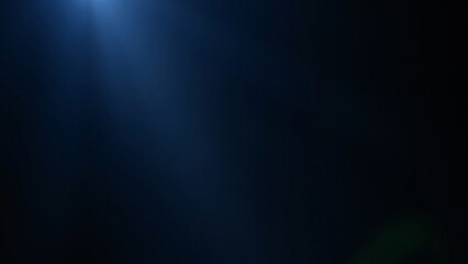 Fototapeta premium Abstract Blue Light Beam on Black Background - Dramatic Lighting Effect
