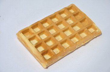 delicious Belgian waffles on a light background