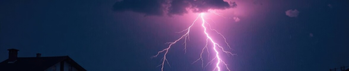 Light source in the dark, amidst rain and thunderstorm, thunder, light